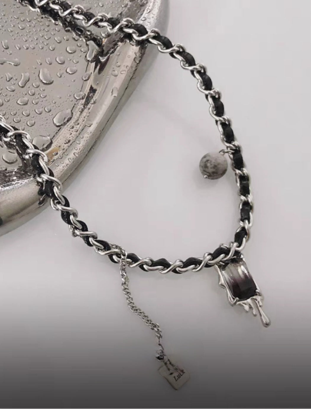 Woman's leather rope rapped in titanium steel chain, lava obsidian pendant necklace