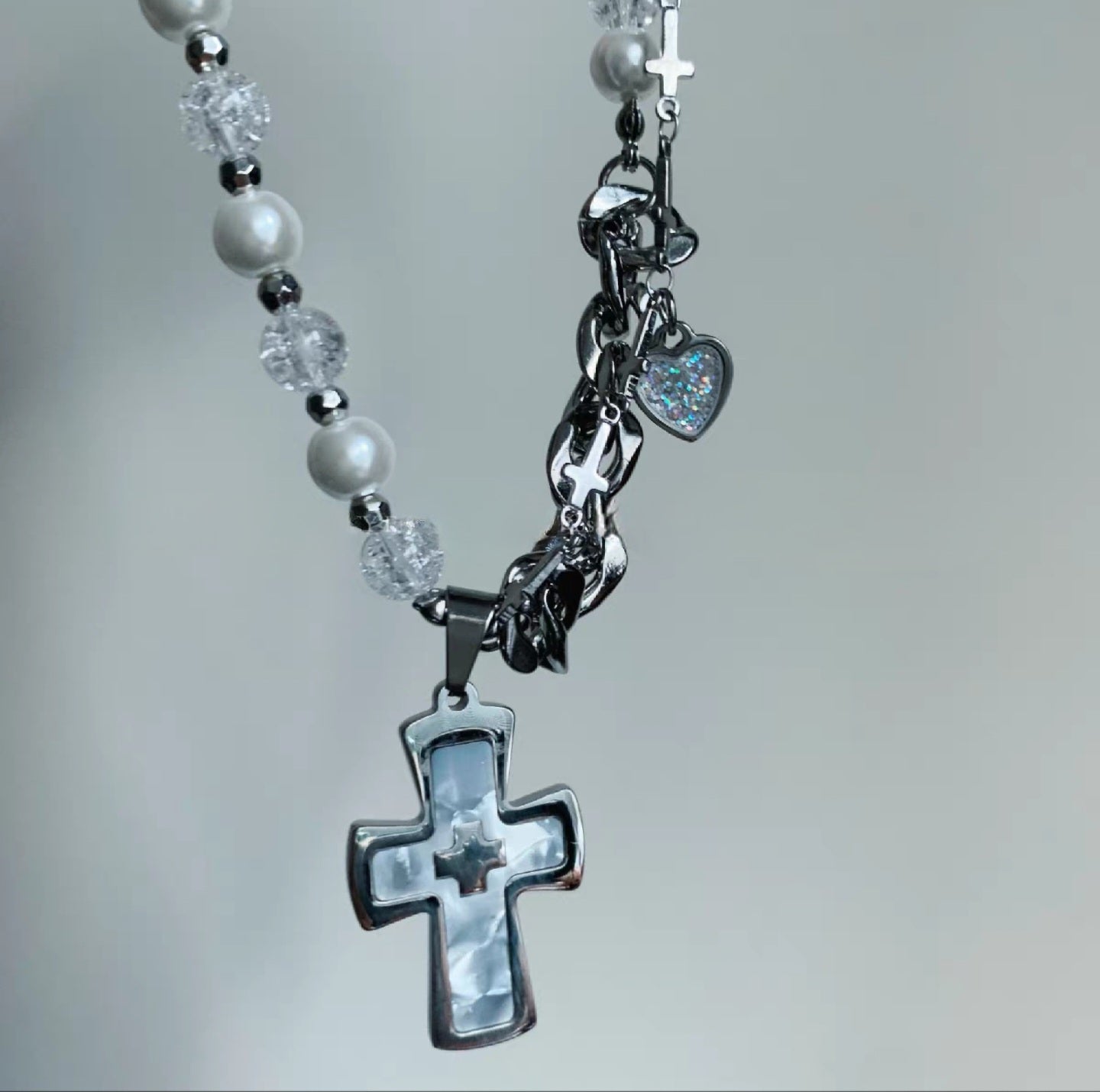 Woman's pearl, crystal, titanium steel chain with cross pendant necklace